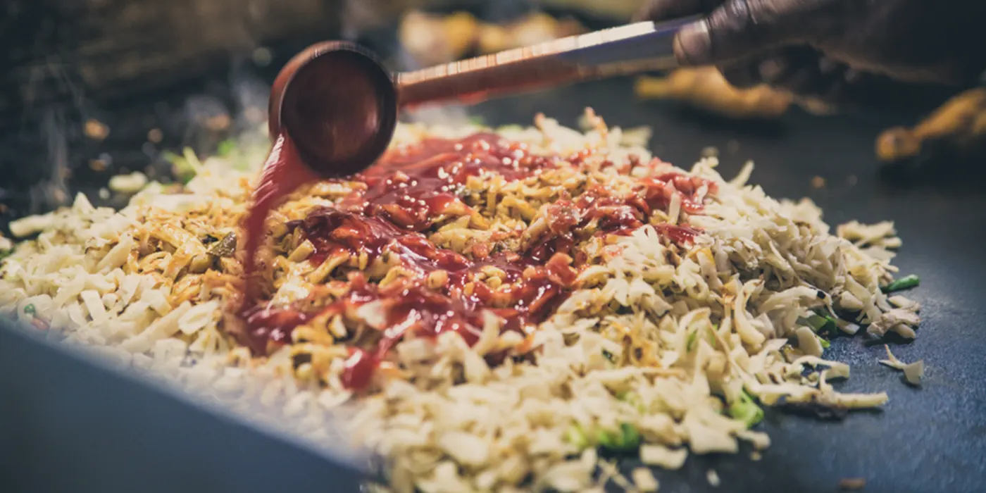 Preparing Kottu Roti